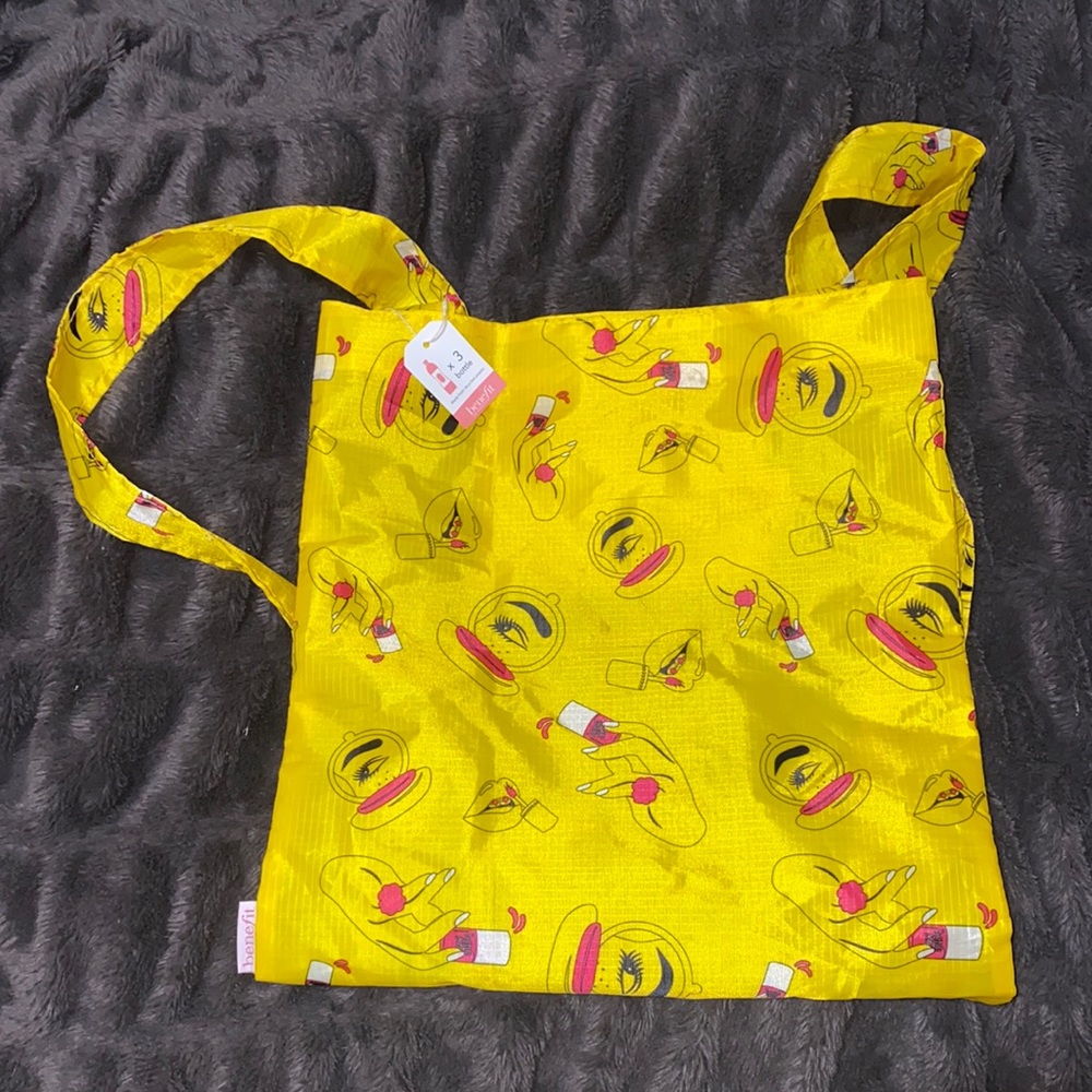 🛍️NWT Limited Benefit yellow makeup design reversible backpack/ bag! - Picture 2 of 5